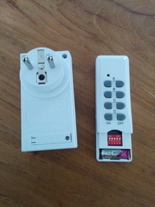 Remote and power socket with DIP-switch.